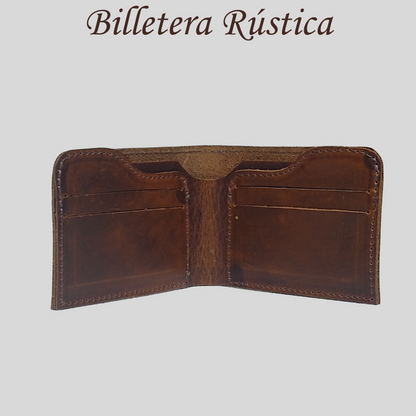Billetera rústica de cuero abierta mostrando compartimentos